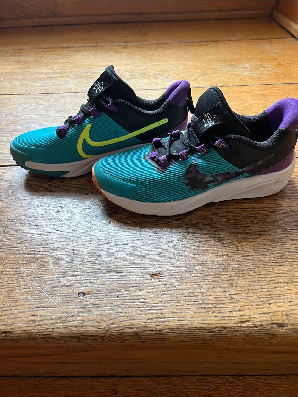 Nike Kids Teal and Purple Running Sneakers with Neon Yellow Swoosh